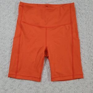 Athleta Orange Haze Ultimate Stash Pocket 7" Short women's XS bike compression